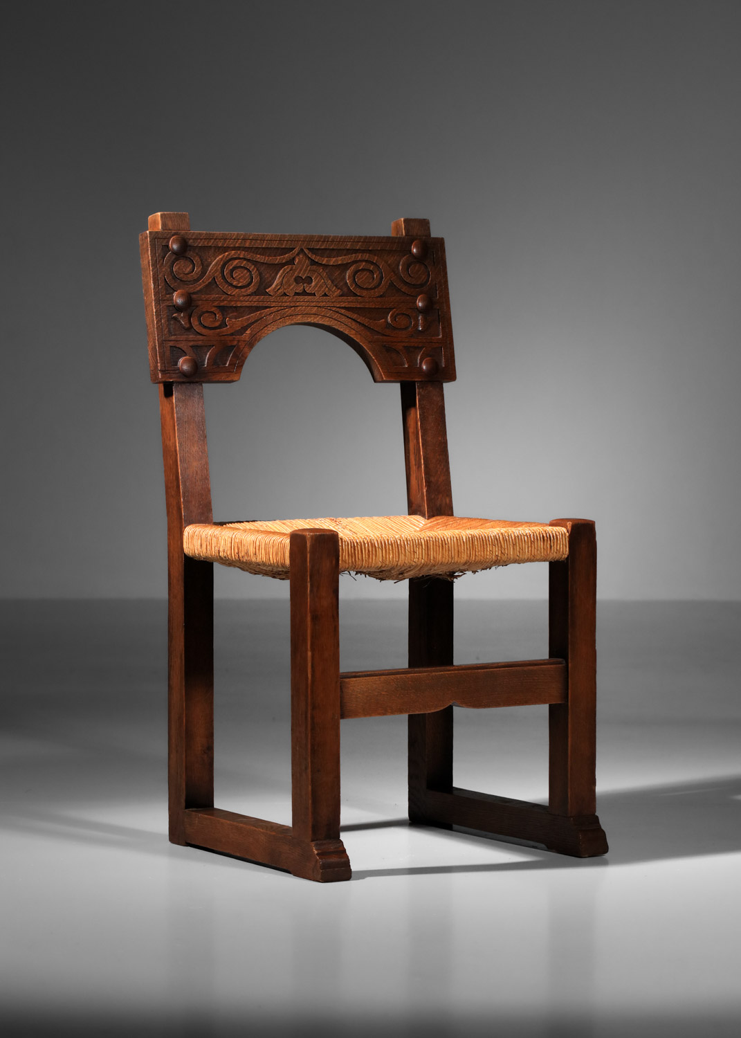 Suite de 2 fauteuils et 6 chaises en chêne massif et osier des années 50 dossier sculpté style SAVINA Joseph