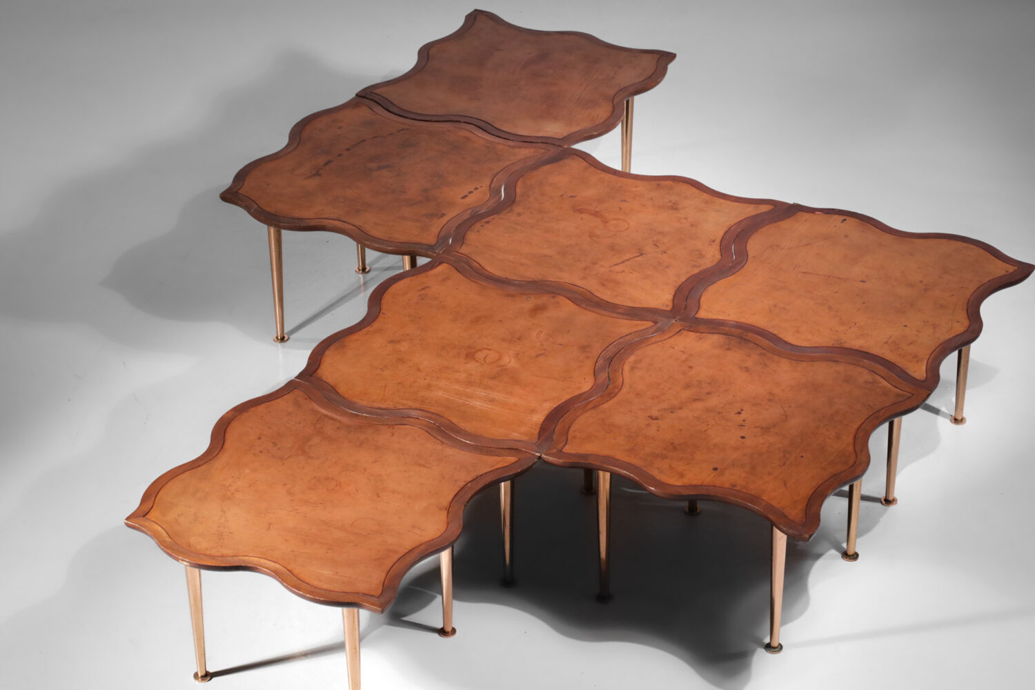 set of seven puzzle coffee tables from the 60s and 70s in patina leather - E508